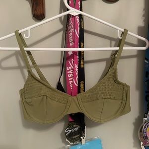 Xhiliration by target green bikini top in a size small.